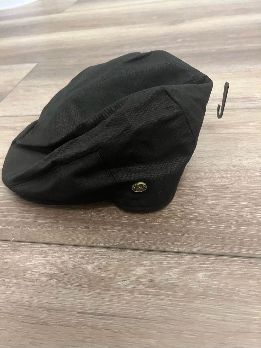 Men's Black Wool Flat Cap with Subtle Metal Accent